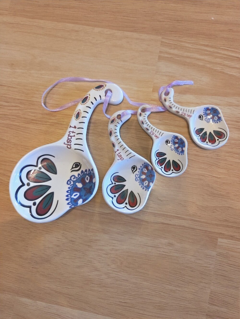 Set Of 4 Porcelain Elephant Measuring spoons On A Pink Ribbon Used For Display